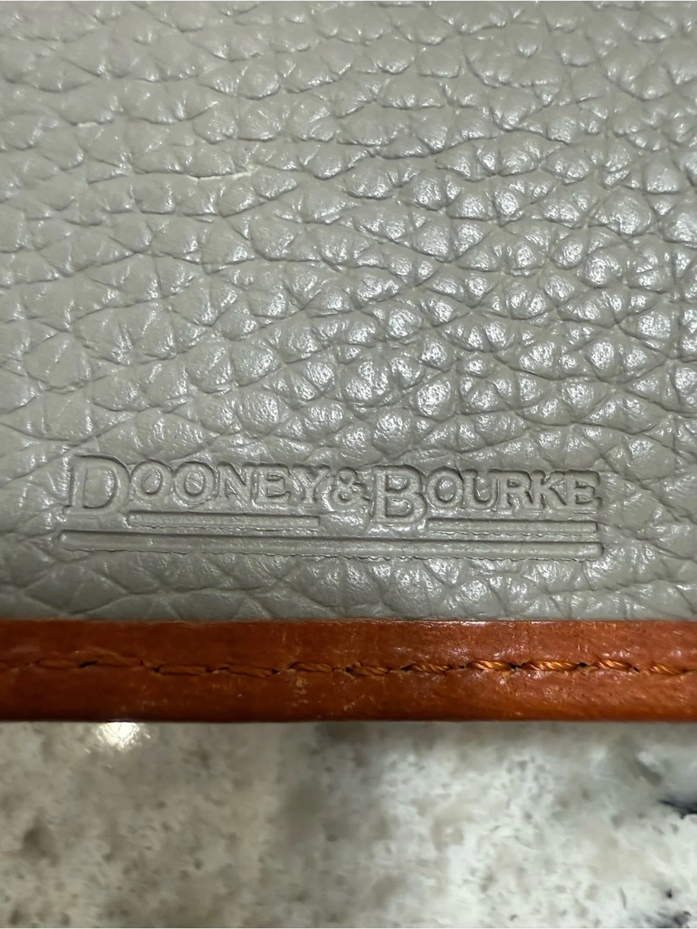 Dooney & Bourke Pebble Grain Continental Clutch Wallet in Gray with Tan Trim